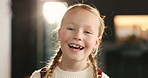 Happiness, laughing and face of girl in home for playing or  on weekend in living room. Smile, child and portrait of playful female kid in house for funny joke, satisfaction or childhood in Australia