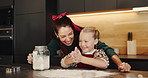 Smile, baking and mother with child in kitchen for learning, bonding or cooking together in home. Happy, teaching and mom with girl kid for preparing cookies, cake or dessert with flour in house.