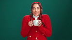 Happy, hot chocolate and face of woman in studio with winter drink for christmas holiday. Smile, cosy and portrait of female person from Brazil with eggnog for xmas season by green background.