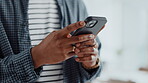 Hands, man and typing with phone in office for research, news editor and feedback of source contact. Journalist, mobile or review for fact check, communication and proofreading article of publication