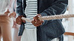Pull rope, teamwork and hands for competition, game and challenge with business people in office. Group, tug of war and cooperation with strength, power and collaboration with synergy for contest