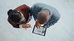 Business people, meeting or discussion with tablet above for product advertising or marketing. Top view, businessman or woman with technology, research or web for information on corporate investment