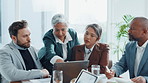 Laptop, discussion and business people in office with teamwork for investment planning. Computer, meeting and group of financial advisors with manager for feedback, review or advice in workplace.