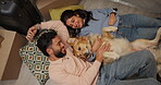 Moving in, couple and playing with dog in new house for security, mortgage purchase or real estate. Above, people and excited with pet on floor for property investment, first home or bonding together