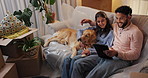 Tablet, dog and happy couple in new home to search for renovation idea, app or moving checklist. Man, woman and pet on sofa with technology for planning, relocation and mortgage payment plan