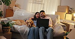 Laptop, dog and couple laugh in new home for streaming show, entertainment or moving service review. Man, woman and pet on sofa with technology for online movie, relocation and watching series