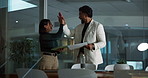 Teamwork, tablet and high five with business people in office for feedback, broker firm and night. Stock market performance, collaboration and documents with employees for overtime and success report