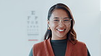 Eye exam, face and glasses with customer at optometry clinic for prescription frame lens fitting. Ophthalmology, test and vision with smile of woman in eyewear store to correct or improve eyesight