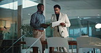 Businessmen, night and discussion with documents or tablet for financial report or project budget. Male people, employees or analyst working late with technology or statistics for business finance