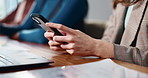 Typing, phone and hands of business woman in office for social media, internet news and networking. Creative agency, worker and person on smartphone for website, online communication and research