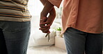 Moving in, couple or holding hands with keys to new house for relocation, goals or mortgage success. Support, security and people in first home with real estate purchase, property investment and loan