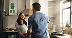 Remodeling, happy couple and dancing in home for love, laughing and diy painting. Man, woman and moving to music in kitchen with energy, holding hands and celebrate house improvement or renovation