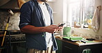Phone, hands and remodeling with man in kitchen for subcontractor research, project and paint idea. Home improvement, renovation and diy supplier contact with person in house for communication