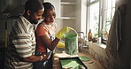 Painting, hug and renovation with black couple in kitchen for remodeling, diy project and bonding. Home improvement, property development and painter with man and woman in house for support and color