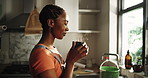 House, thinking and black woman in kitchen, coffee and steam with daydreaming, window and calm. African person, apartment and girl with herbal tea, view and decision with ideas and contemplation