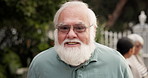 Glasses, face and smile with old man in nursing home for occupational therapy, help and healthcare. Medical, retirement and elderly care with person in garden for wellness and assisted living