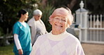 Laughing, face and happy with old woman in nursing home for occupational therapy, help and healthcare. Medical, retirement and elderly care with person in garden for comedy and assisted living