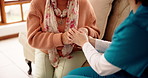Empathy, old woman and nurse holding hands in home for bad news, test results or medical advice. Consulting, caregiver and senior patient with comfort on sofa for cancer diagnosis, support or console