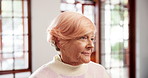 Home, thinking and senior woman with retirement, sad and memory with dementia. Apartment, pensioner and elderly person with wonder, nostalgia and depression with wellness, decision and alzheimer
