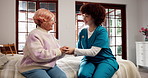 Home, nurse and old woman in bedroom, holding hands and recovery with retirement. Pensioner, elderly person and caregiver with empathy, trust or rehabilitation with wellness, conversation or healing