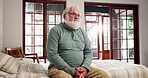 Alone, depression and thinking with senior man in retirement home for memories or nostalgia. Relax, regret and sad with unhappy old person in bedroom of apartment for contemplation or mental health