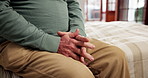 Concern, fear and stress with hands of old person in bedroom of retirement home for uncertainty. Afraid, anxiety and worry with nervous senior in apartment for difficulty, phobia or memory loss