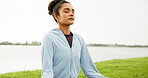 Breathing, meditation and yoga with woman outdoor at lake for balance, inner peace or mindfulness. Awareness, health and wellness with calm yogi person in nature for holistic healing, quiet or zen