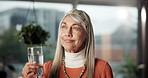 Drinking water, smile and thinking with mature woman in home for health, vision or wellness. Beverage, hydration and reflection with happy senior person in apartment for memories or nostalgia