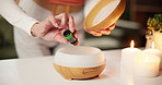 Atmosphere, hands and incense with person in spa for aromatherapy, relax or wellness session. Ambience, essential oil and fragrance with masseuse getting ready for holistic healing or treatment