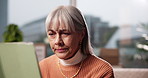 Confused, tablet and senior woman in home for reading online news, puzzle or sudoku on app. Thinking, digital technology and elderly person in retirement with bingo notification, contact or blog.