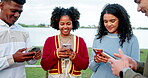 Phone, smile and social media with friends outdoor together for connection or networking. App, text message and typing with group of happy people in nature for contact, information or internet search