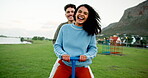Face, laughing and fun with couple on seesaw together for bonding, dating or romance outdoor. Happy, love or relationship with excited man and funny woman at lake in park for playful activity