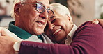 Smile, love and hug with mature couple on sofa for bonding, romance and happiness. Care, support and marriage with senior man, woman and living room of home for relationship and relax together