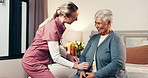 Happy women, nurse or dressing with senior patient on bed for assisted living in retirement home. Female people, caregiver and clothing with elderly care for comfort, support or help in old age house