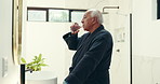 Senior man, bathroom or medication with water for medical symptoms or chronic illness in home. Elderly, male person or drinking with mineral liquid or pills for prescription, antibiotic or supplement