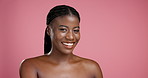Face, skincare and glow with happy black woman in studio for natural beauty or self care. Portrait, cosmetics and African model with facial treatment, shine and dermatology on pink background space