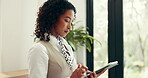Receptionist, hotel or woman with tablet in lobby for booking schedule, check in app or reservation. Hospitality industry, concierge and typing on tech at front desk for accommodation or availability