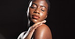 Beauty, glow or woman with body care in studio with healthy skin, collagen shine or hydration. Mockup, clean and african girl with confidence for cosmetics treatment and wellness on black background
