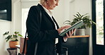 Mature, hotel or hands of businesswoman with tablet for networking, online booking or work trip. Hospitality, arrival and guest with technology for travel schedule, reservation and email with bag