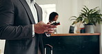 Phone, hotel and hands of business man for networking, online booking and website for work trip. Hospitality, typing and person with suitcase on smartphone for travel schedule, internet and email
