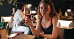 Woman, talking or wine at restaurant for date, friendly conversation or people out at night. Couple, alcohol and anniversary milestone in events venue with connection, bonding or discuss relationship