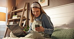 Happy, woman and message on smartphone, bedroom and ghostwriter with laptop for remote work or home. Online, freelancer and notification on mobile in house, texting and person with tech for ebook