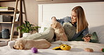 Phone, dog mom and puppies playing on bed in home bedroom for fun, social media or bonding. Pet insurance, adoption and house with golden retriever animals and woman with belly rub, internet and care