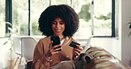 Credit card, phone and woman on sofa in home with online shopping for sale, discount or promotion. Cellphone, debit and female person on website for fashion store on mobile app in living room.