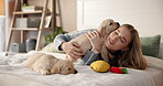 Smile, woman and hug with dog on bed for companion, connection and bonding together. Female person, embrace and rescue puppy with love, animal affection and labrador adoption for pet care at house