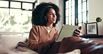 Tablet, headphones and woman in home for music, streaming podcast or think of sound. Radio, tech and happy African person relax in living room for online audio, song choice and scroll on audiobook