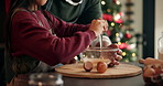 Dad, girl and help with egg crack at Christmas with cooking, teaching and ingredients for cookies in home. African people, father and daughter in kitchen, learning and bowl for baking at family xmas