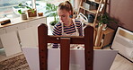 Canvas, easel and painting with student in studio apartment for artistic or creative expression. Inspiration, learning and woman painter in home for art project, drawing activity or hobby from above