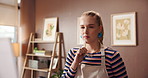 Canvas, easel and thinking with painter in studio apartment for artistic or creative expression. Inspiration, learning and painting with woman in home for art project, drawing activity or hobby