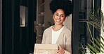 Box, face and smile of woman in doorway of home for cardboard package delivery or parcel shipment. Ecommerce, entrance and distribution with happy person in apartment for courier or shopping service